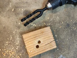 Where to drill the hole in skid plate for the grease zirk on the front driveshaft-crew